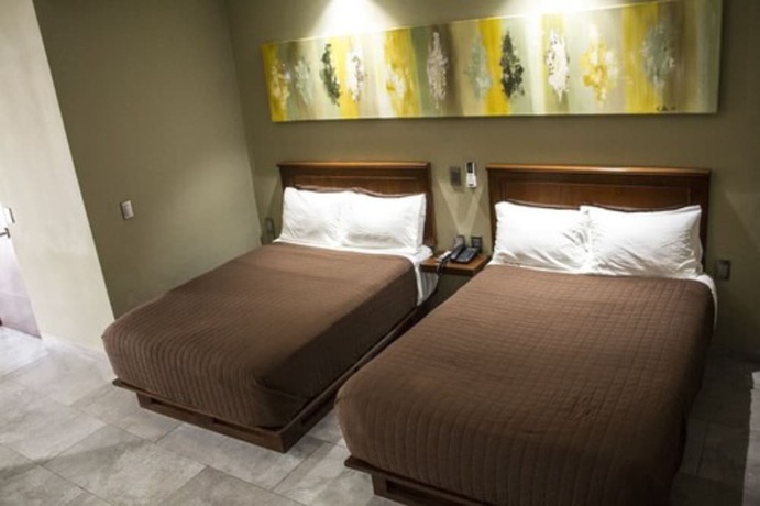 Imagen de la habitación del Hotel Luna Inn. Foto 20