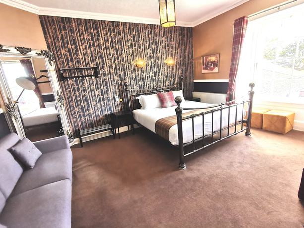 Imagen de la habitación del Hotel Lunan House. Foto 5