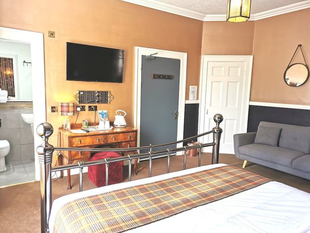 Imagen de la habitación del Hotel Lunan House. Foto 11