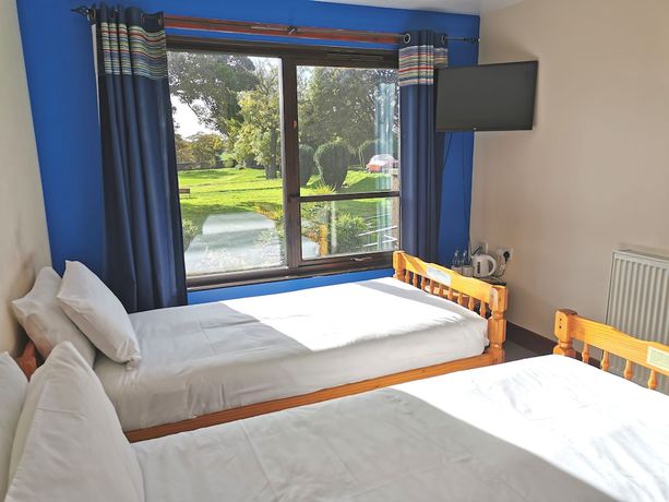 Imagen de la habitación del Hotel Lunan House. Foto 17