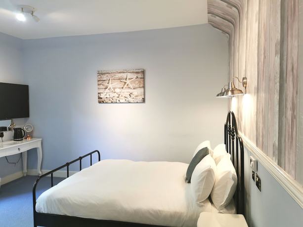 Imagen de la habitación del Hotel Lunan House. Foto 18