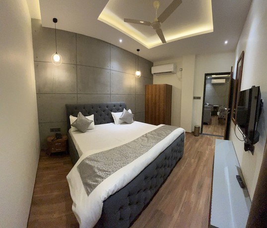 Imagen de la habitación del Hotel Lunar Stays. Foto 13