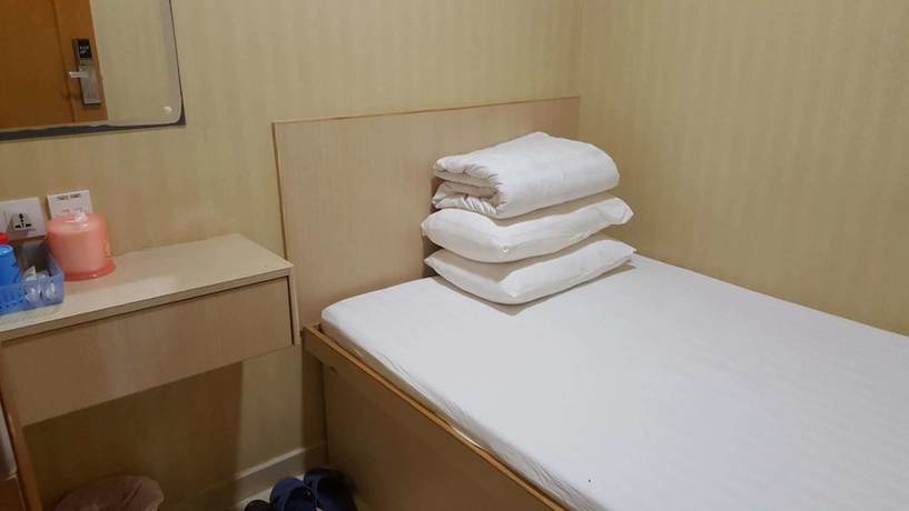 Imagen de la habitación del Hotel Lung Wa. Foto 9