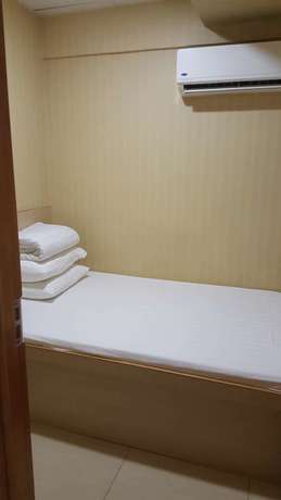 Imagen de la habitación del Hotel Lung Wa. Foto 15