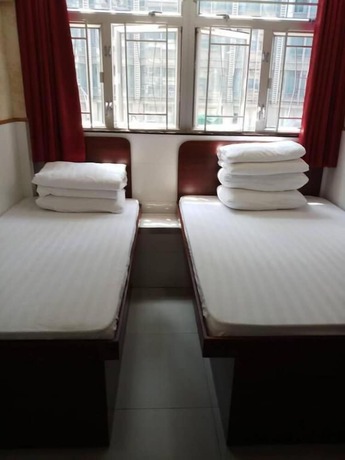Imagen de la habitación del Hotel Lung Wa. Foto 16