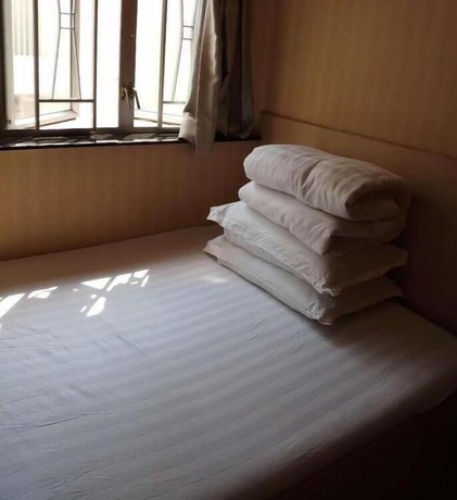 Imagen de la habitación del Hotel Lung Wa. Foto 18