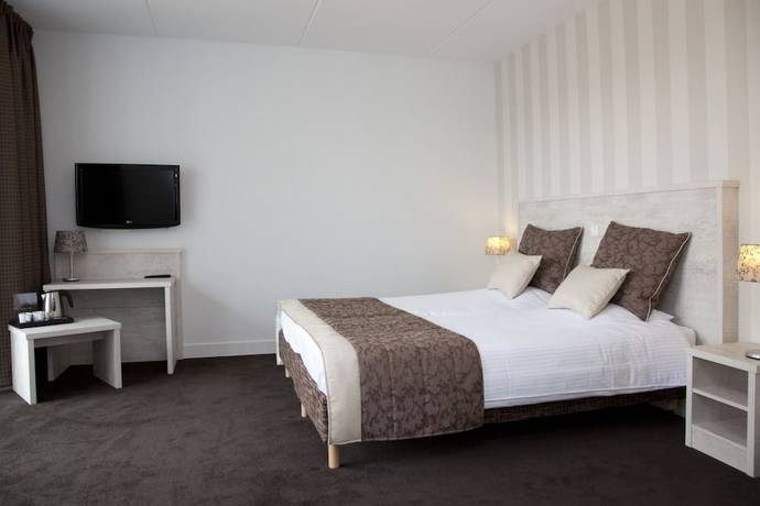 Imagen de la habitación del Hotel Lunia. Foto 18