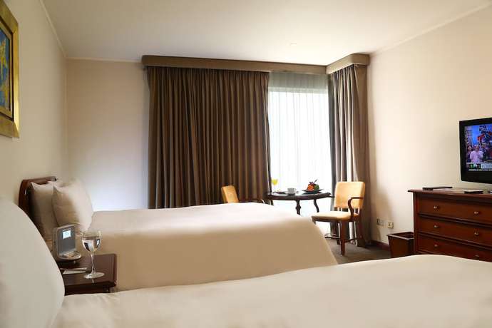 Imagen de la habitación del Hotel Luoxo. Foto 16