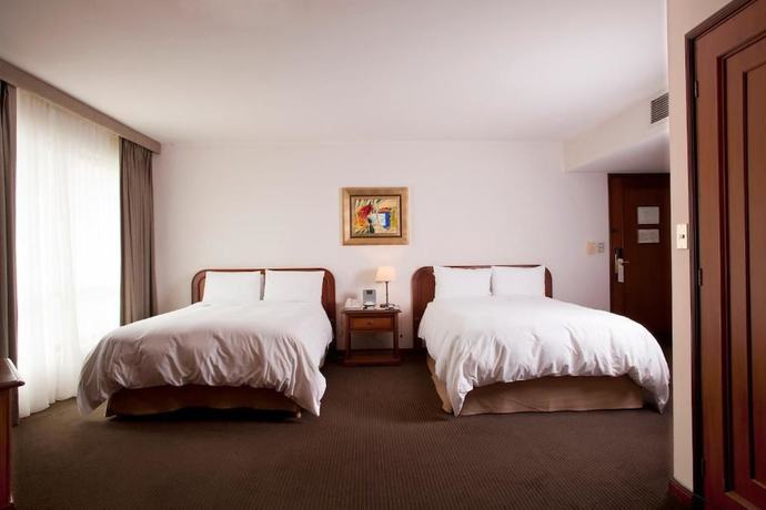 Imagen de la habitación del Hotel Luoxo. Foto 17