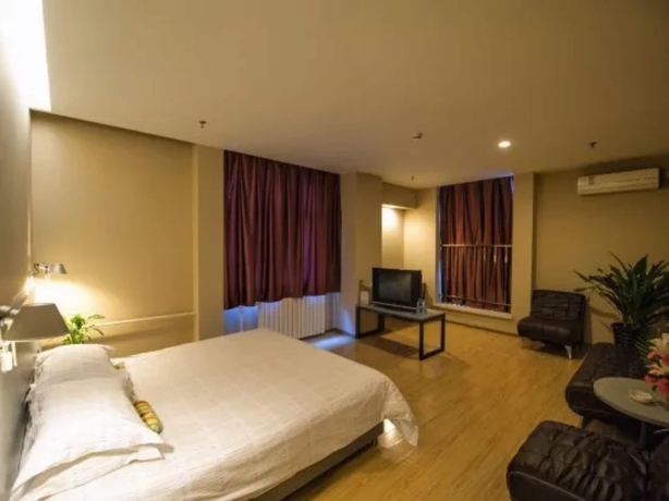 Imagen de la habitación del Hotel Luoyang Aviation E-home Inn. Foto 9