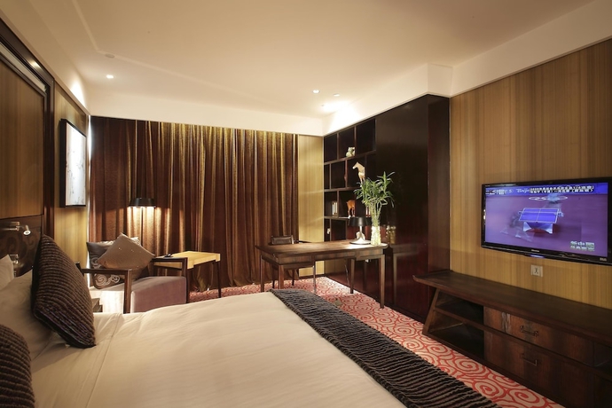Imagen de la habitación del Hotel Luoyang Christian's. Foto 9