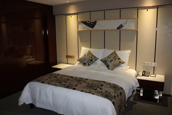 Imagen de la habitación del Hotel Luoyang Dawei Jiuchao Xigong. Foto 7