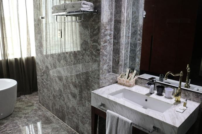 Imagen de la habitación del Hotel Luoyang Dawei Jiuchao Xigong. Foto 11