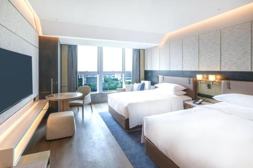 Imagen de la habitación del Hotel Luoyang Marriott. Foto 9
