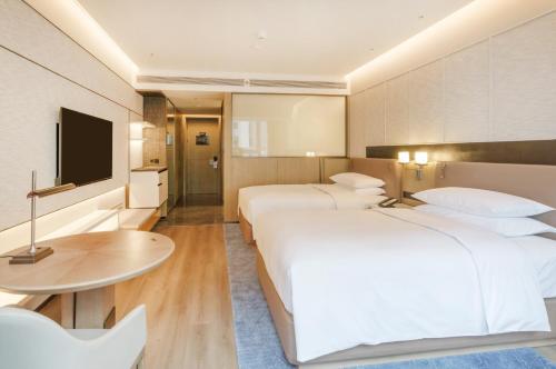 Imagen de la habitación del Hotel Luoyang Marriott. Foto 10