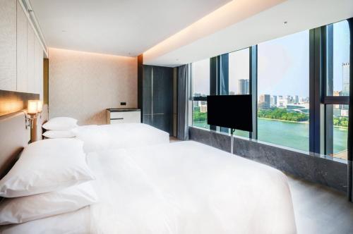 Imagen de la habitación del Hotel Luoyang Marriott. Foto 11
