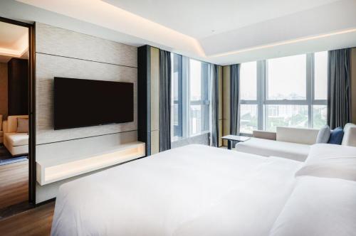 Imagen de la habitación del Hotel Luoyang Marriott. Foto 12