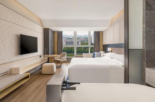 Imagen de la habitación del Hotel Luoyang Marriott. Foto 13