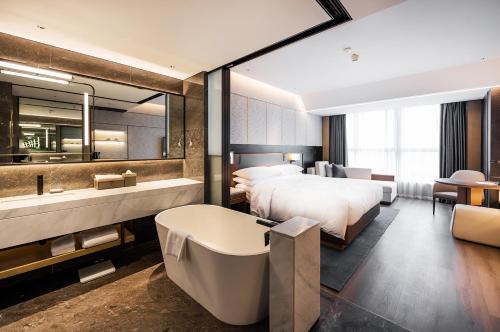 Imagen de la habitación del Hotel Luoyang Marriott. Foto 14