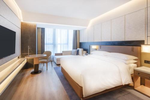 Imagen de la habitación del Hotel Luoyang Marriott. Foto 15