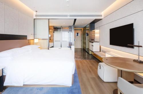 Imagen de la habitación del Hotel Luoyang Marriott. Foto 17