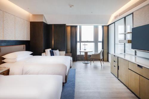 Imagen de la habitación del Hotel Luoyang Marriott. Foto 18