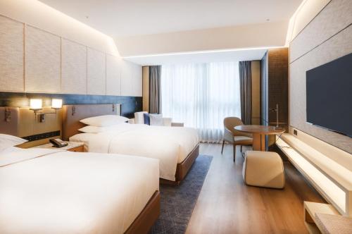 Imagen de la habitación del Hotel Luoyang Marriott. Foto 19