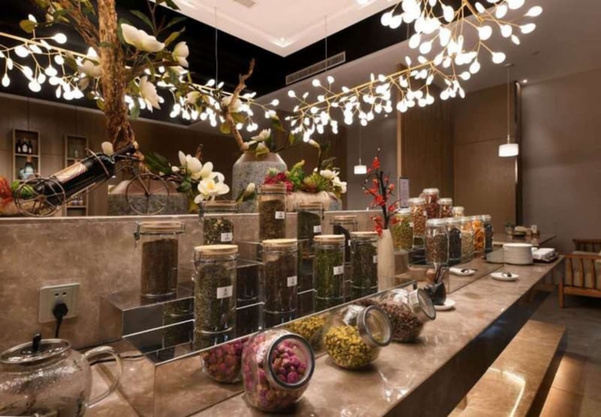 Imagen del bar/restaurante del Hotel Luoyang Mehood Lestie Xiyuan. Foto 2