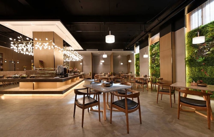 Imagen del bar/restaurante del Hotel Luoyang Mehood Lestie Xiyuan. Foto 4