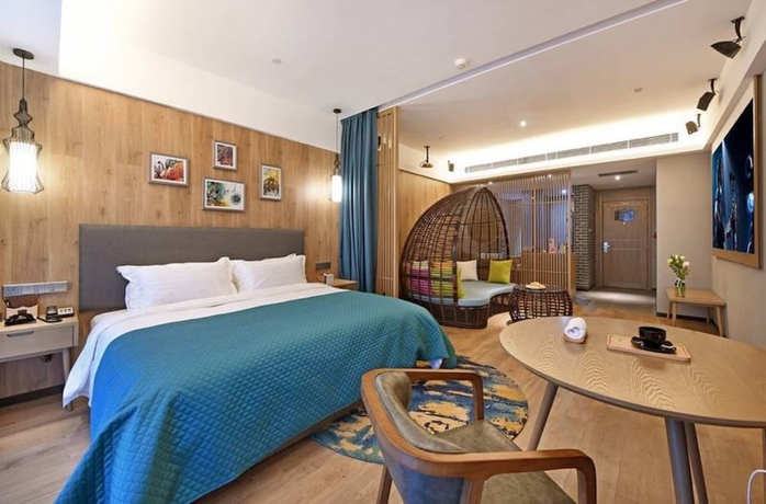 Imagen de la habitación del Hotel Luoyang Mehood Lestie Xiyuan. Foto 9