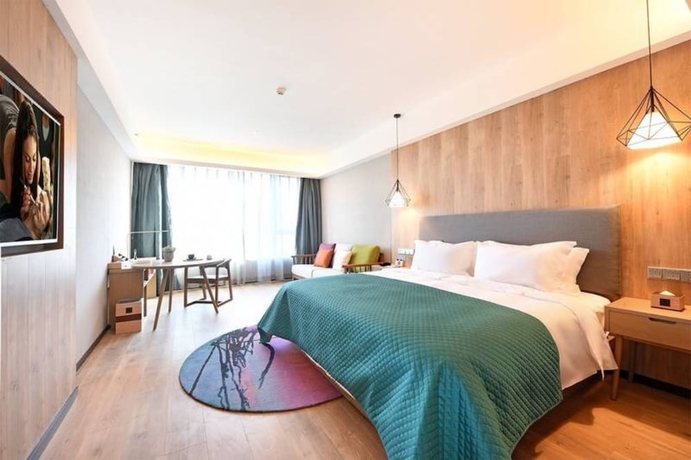 Imagen de la habitación del Hotel Luoyang Mehood Lestie Xiyuan. Foto 10
