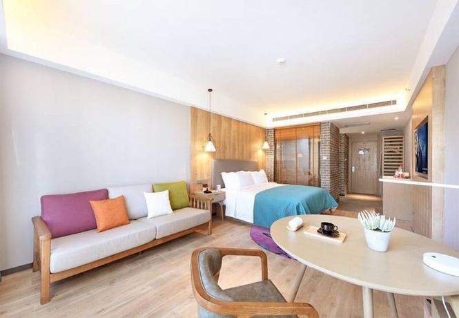 Imagen de la habitación del Hotel Luoyang Mehood Lestie Xiyuan. Foto 11