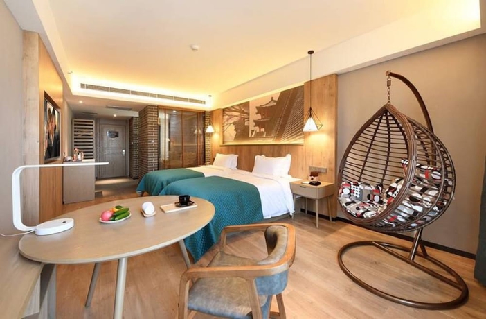 Imagen de la habitación del Hotel Luoyang Mehood Lestie Xiyuan. Foto 12