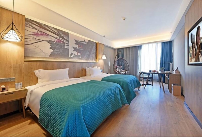 Imagen de la habitación del Hotel Luoyang Mehood Lestie Xiyuan. Foto 14
