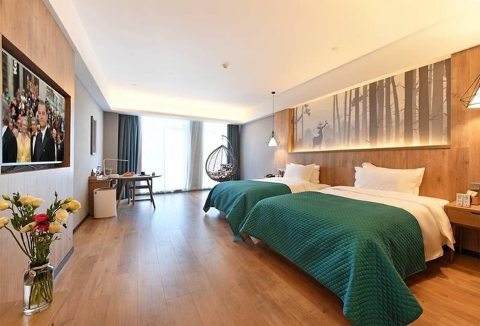Imagen de la habitación del Hotel Luoyang Mehood Lestie Xiyuan. Foto 15