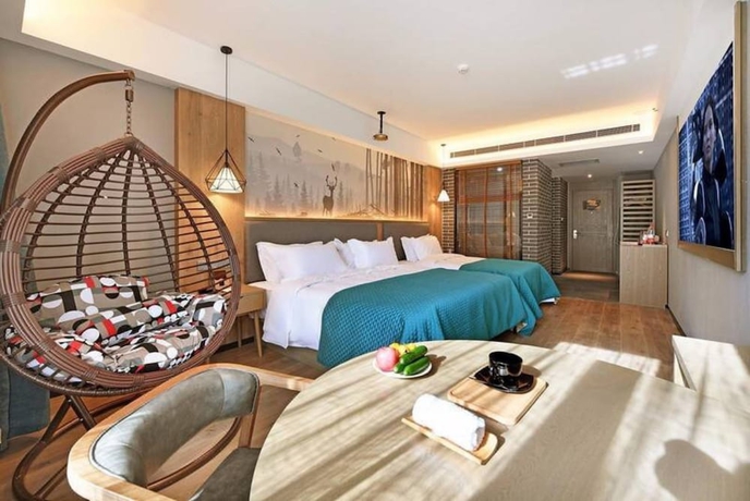 Imagen de la habitación del Hotel Luoyang Mehood Lestie Xiyuan. Foto 16