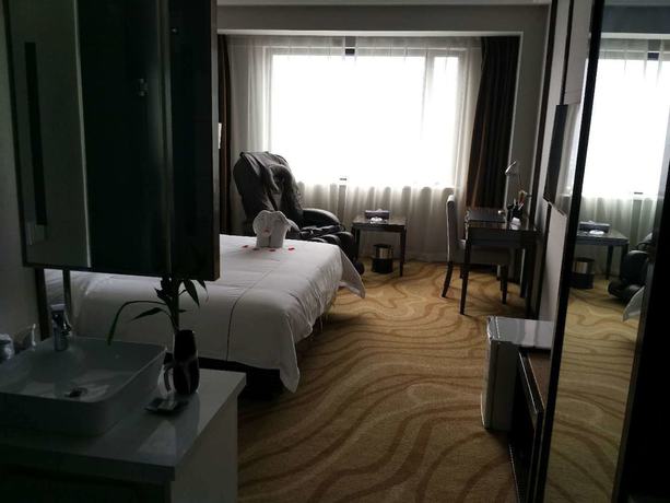 Imagen de la habitación del Hotel Luoyang Yihe. Foto 8