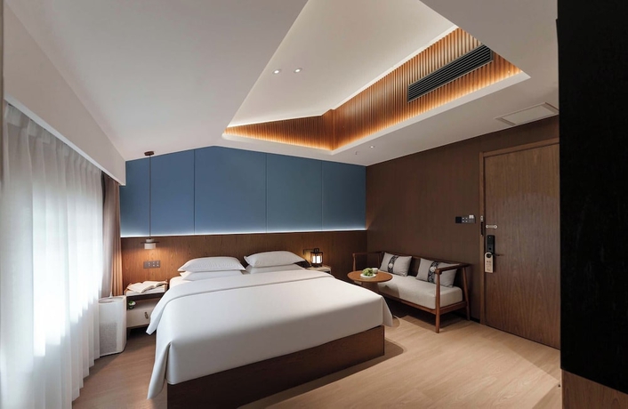 Imagen de la habitación del Hotel Luoyang Yunhuali. Foto 7