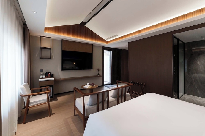 Imagen de la habitación del Hotel Luoyang Yunhuali. Foto 8
