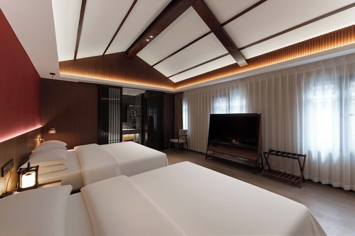 Imagen de la habitación del Hotel Luoyang Yunhuali. Foto 10