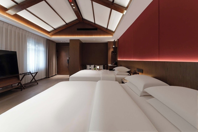 Imagen de la habitación del Hotel Luoyang Yunhuali. Foto 11