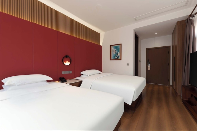 Imagen de la habitación del Hotel Luoyang Yunhuali. Foto 12