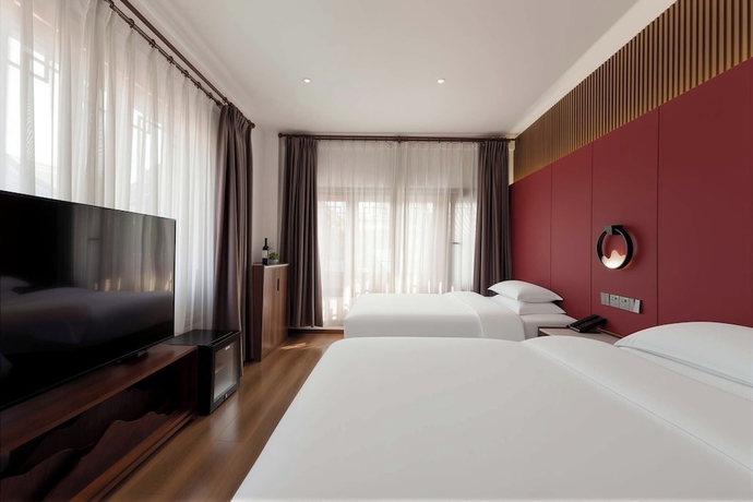 Imagen de la habitación del Hotel Luoyang Yunhuali. Foto 13