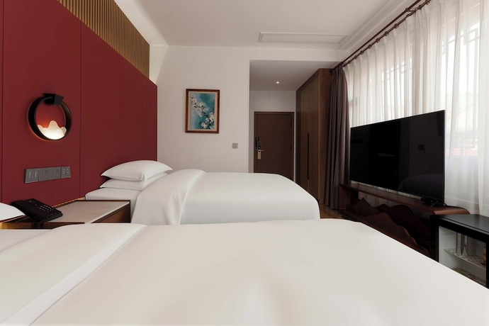 Imagen de la habitación del Hotel Luoyang Yunhuali. Foto 14