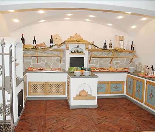 Imagen del bar/restaurante del Hotel Lupo Bianco Wellness and Walking. Foto 8