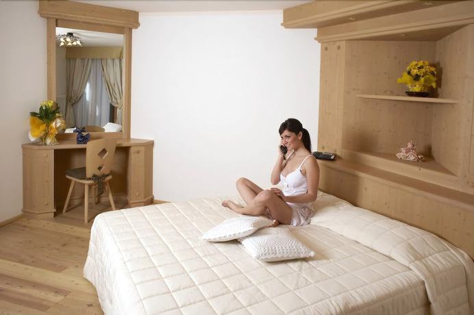 Imagen de la habitación del Hotel Lupo Bianco Wellness and Walking. Foto 13