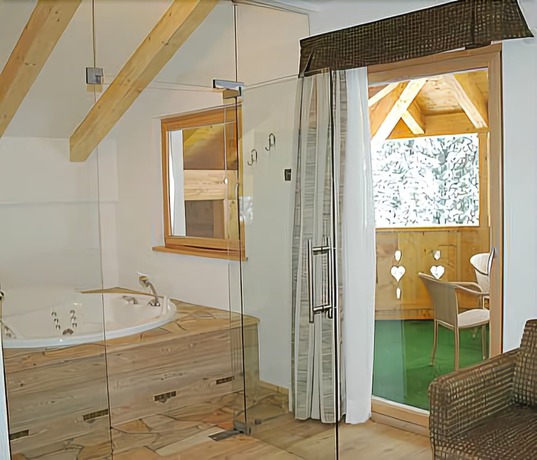Imagen de la habitación del Hotel Lupo Bianco Wellness and Walking. Foto 15