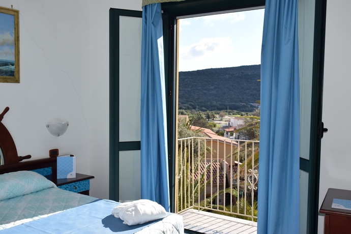 Imagen de la habitación del Hotel Lu&rsquo; Maladroxia. Foto 4