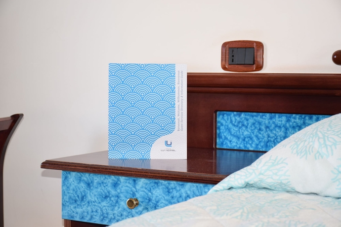 Imagen de la habitación del Hotel Lu&rsquo; Maladroxia. Foto 13