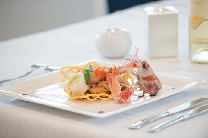 Imagen del bar/restaurante del Hotel Lu&rsquo; Maladroxia. Foto 3